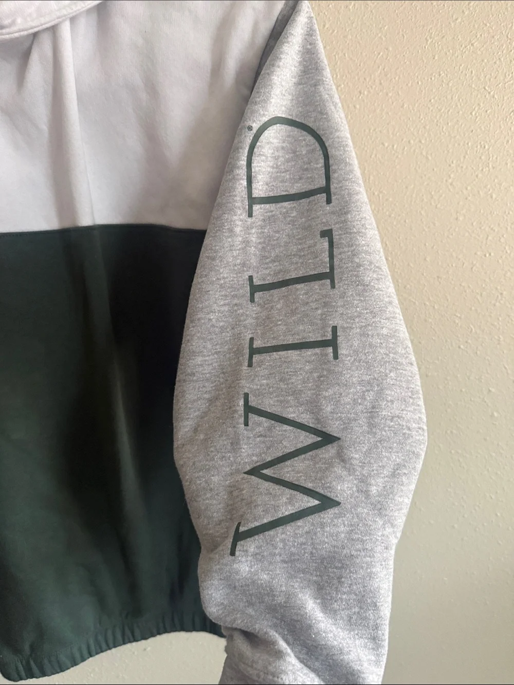 NHL Colorblock Half-Zip Jacket in Dark Green, White & Gray